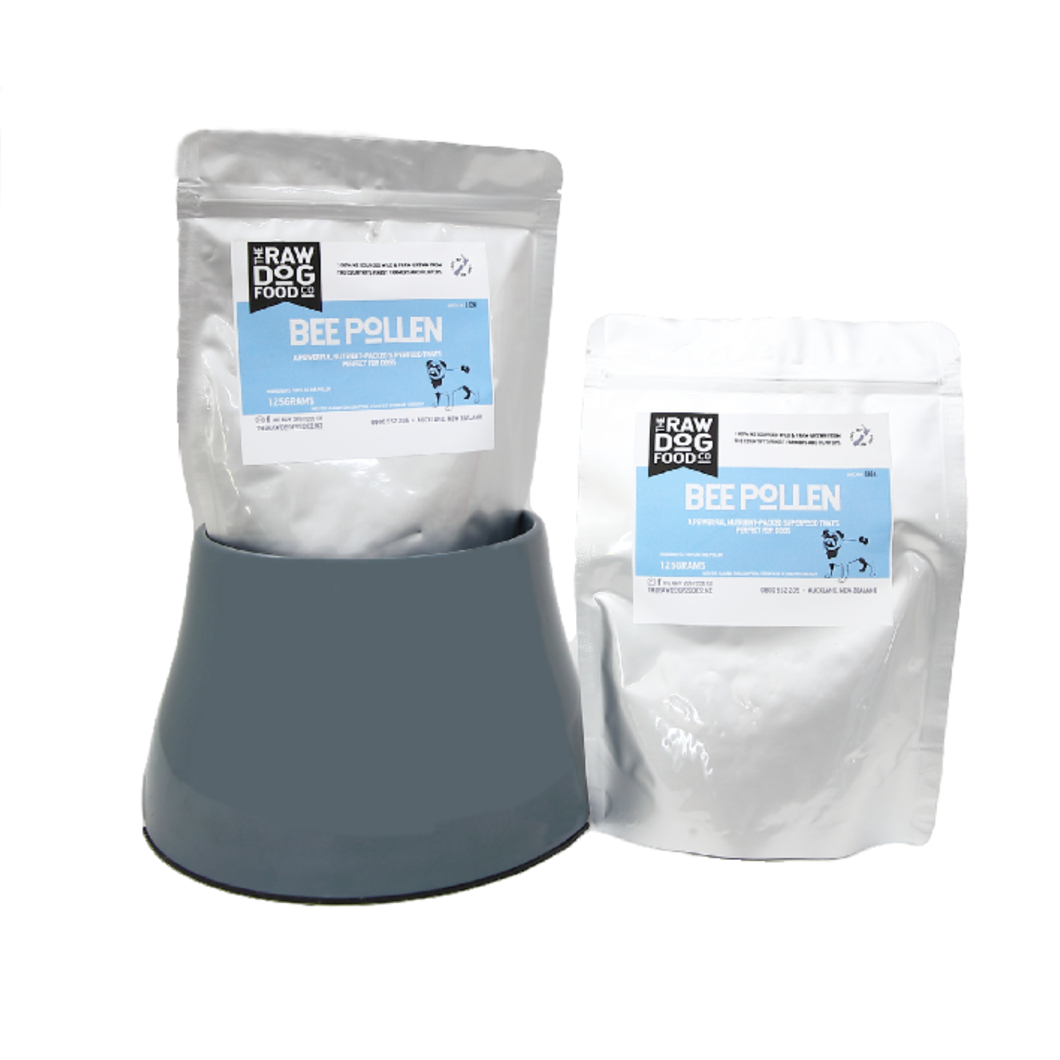 Two packets of Raw Dog Bee Pollen for Dogs, one in a standing pouch and the other in a lying pouch, both with blue labels and pollen visible inside.