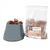 A package of frozen beef liver cubes next to a dog bowl, indicating the product is pet food.