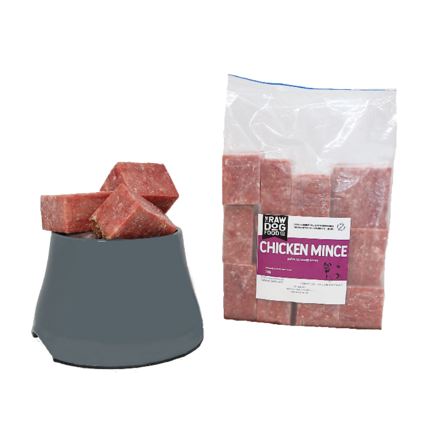 Packaged raw pet food chicken mince with bone in a plastic bag, alongside a bowl with chicken cubes.