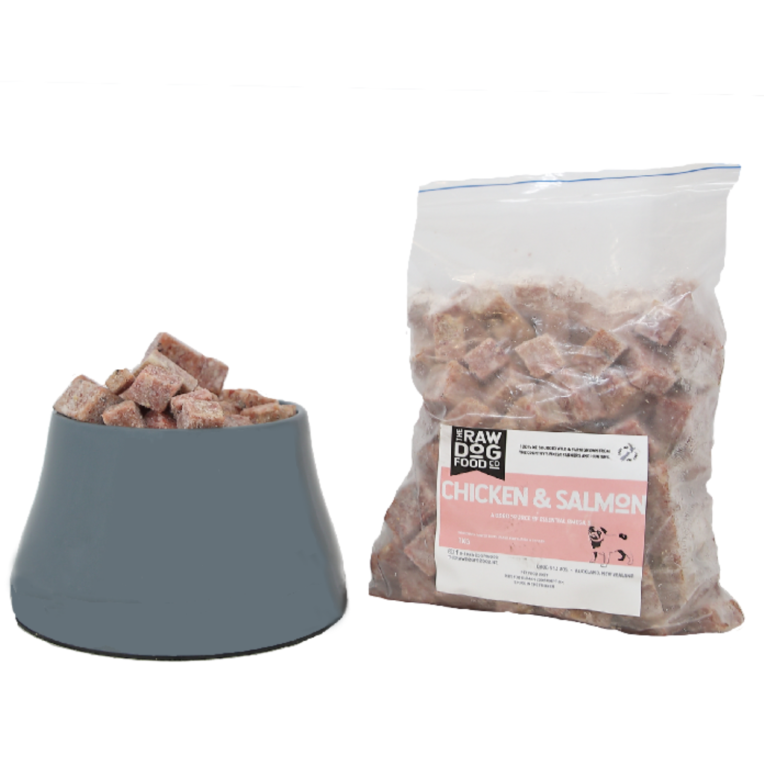 A packaged product labeled 'Chicken & Salmon' next to a bowl filled with cubed mixed pet food.