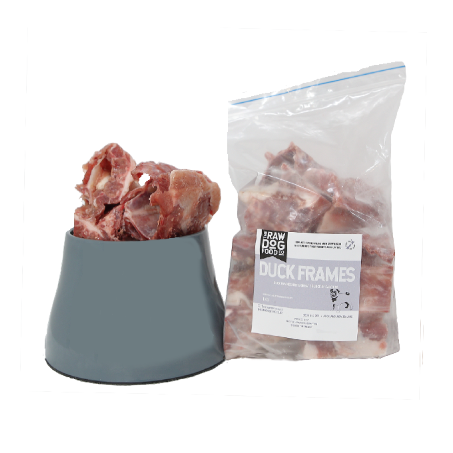 A package of frozen duck frames next to a bowl filled with the same frozen frames, intended as pet food.