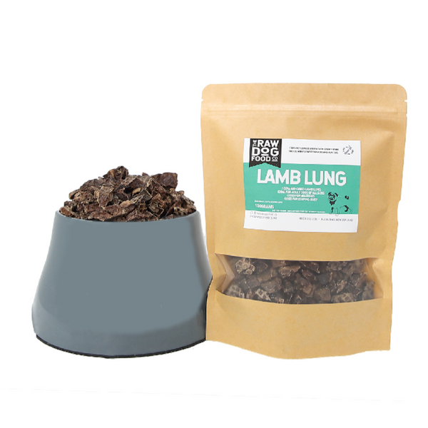 A packaged product labeled 'LAMB LUNG' next to a bowl filled with air-dried lamb lung pieces.