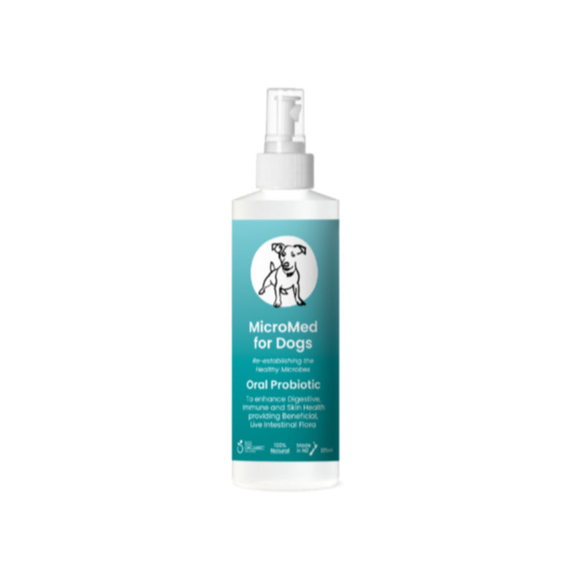 A bottle of MicroMed Oral Probiotic for dogs, with a label showing a white dog and text.