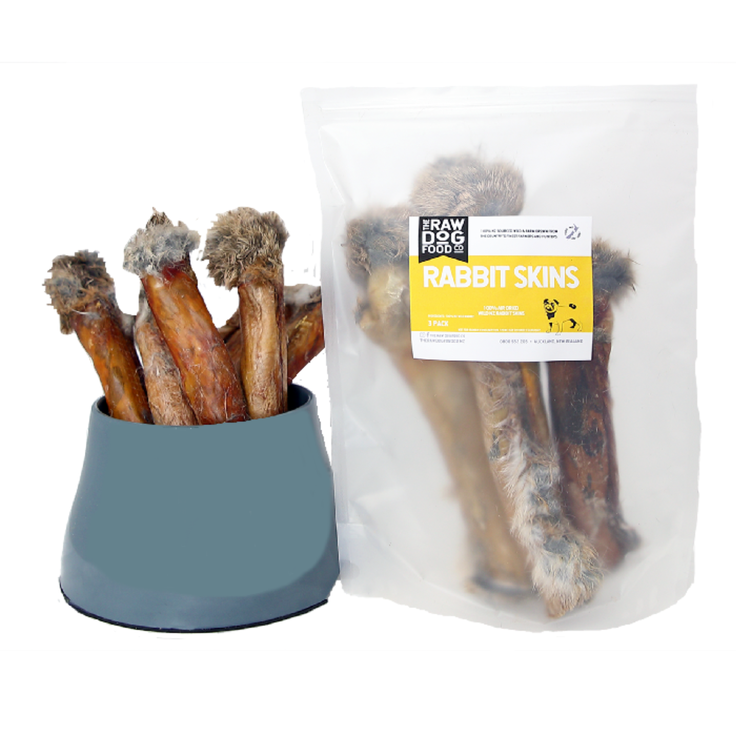 A package of air-dried wild rabbit skin treats for pets, displayed alongside a bowl filled with the same treats.