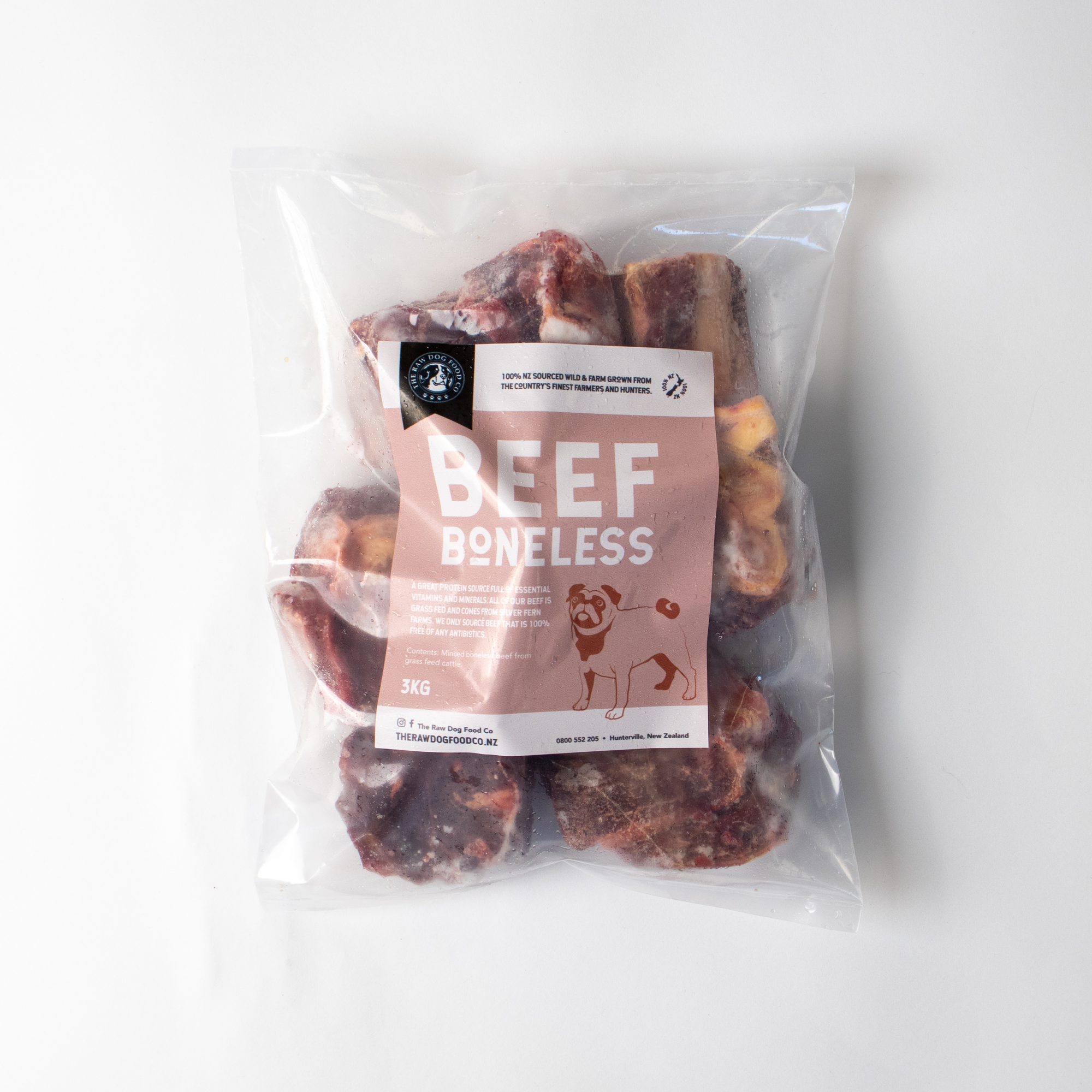 A packaged product labeled 'BEef MEAT' next to a bowl with pieces of beef inside, indicating that it is frozen boneless beef cubes intended for pet food.