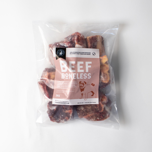 A packaged product labeled 'BEef MEAT' next to a bowl with pieces of beef inside, indicating that it is frozen boneless beef cubes intended for pet food.
