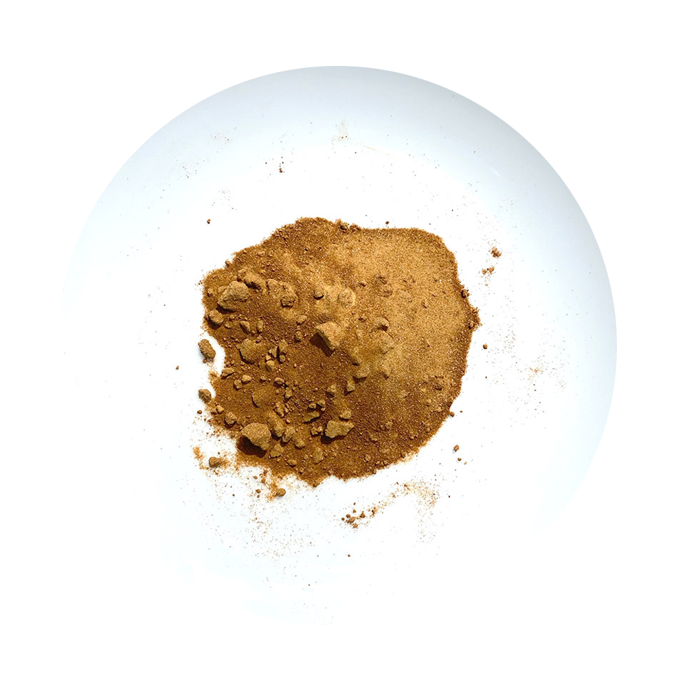 A picture of a plate with Green Lipped Mussel Powder intended for pets. 