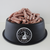 A bowl of frozen raw puppy food 