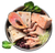 A bowl of frozen dog food which includes various proteins like meat and offal.