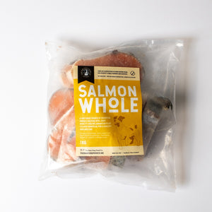 An image of frozen salmon steaks intended for pet food consumption.